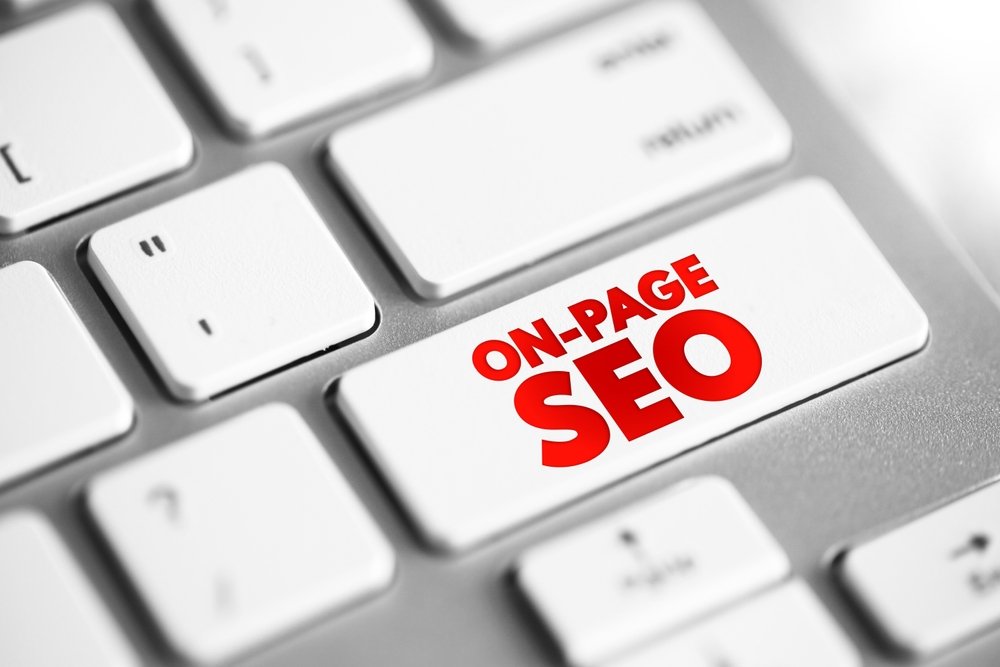 Keyboard with a red ON-PAGE SEO key, representing on-page search engine optimization concepts.